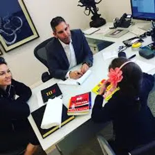 Office discussion over desk