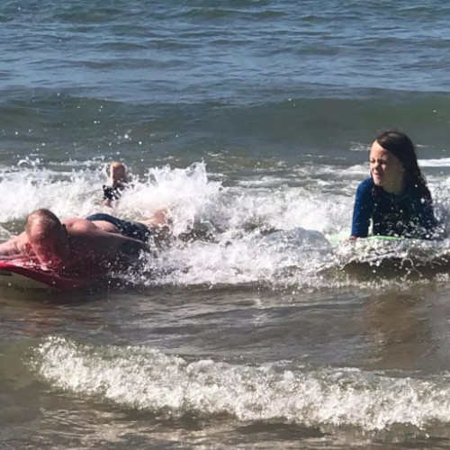 David and Tyler surfing